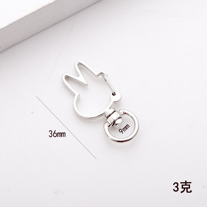 Wholesale shaped keychain metal cat dolphin love five-pointed star cherry blossom shell jewelry accessories diy
